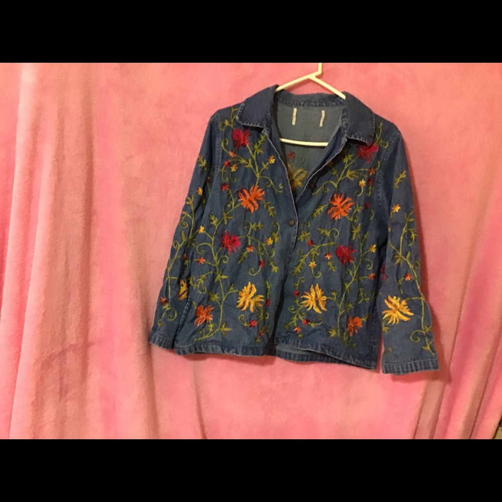 Zip up jean shirt w/ embroidery designs on it!